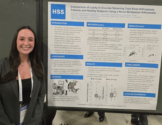 Post-bac researcher Julianna Villella presenting her poster comparing laxity in cruciate-retaining TKA patients using a novel arthrometer