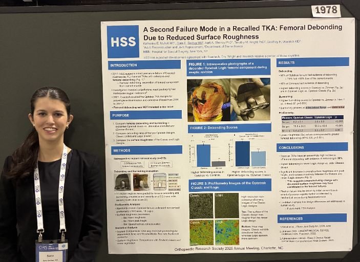 Research engineer Sara Sacher presenting her poster evaluating femoral cement debonding as a second failure mode &nbsp;in a recalled TKA system