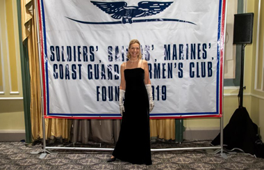 Kathy Trenholm standing tall and happy.